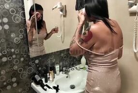 He fucks her in the hotel bathroom