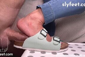 Green Birkenstocks footjob with a huge cumshot on them