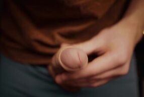 boy with a big dick playing with his foreskin in 4K