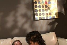 Upon seeing her preferred actor, Carrie becomes fixated on the sofa, adopting a dog-like hold.