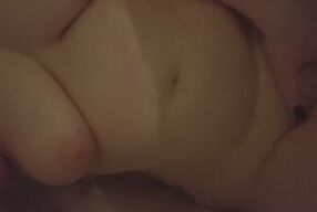 Chubby hottie plays with herself in the bath